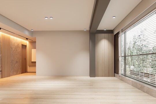 Empty modern living room with wooden flooring and large window blinds