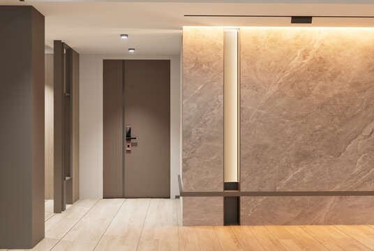 Modern condominium entrance with stone feature wall and sleek door