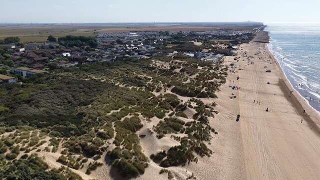 Aerial view of Camber Sands beach during a sunny summer afternoon in England