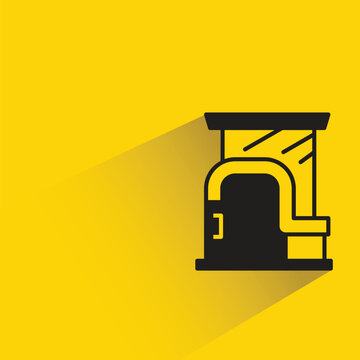 modern house building with shadow on yellow background