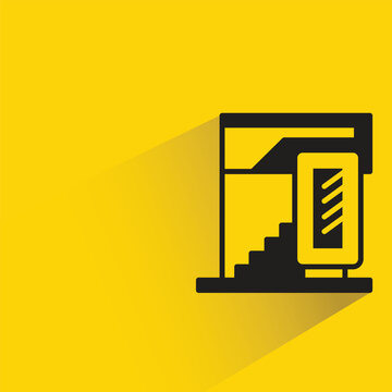 modern house building with shadow on yellow background