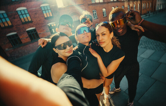 The running team gets together for a selfie before a social run