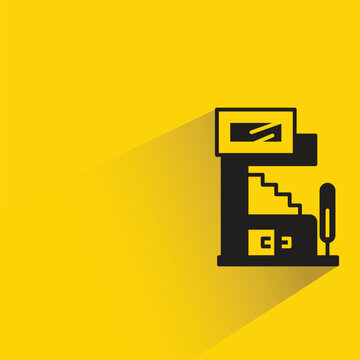 modern house building with shadow on yellow background