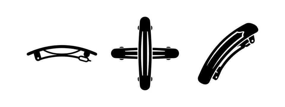 Set of three black hair clips in different styles on a white background