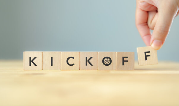 Business kickoff meeting and project launch concept. Placing the final letter to complete &ldquo;KICKOFF,&rdquo; symbolizing project launch, business planning, team alignment, collaboration, a successful start.