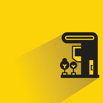 modern house building with shadow on yellow background