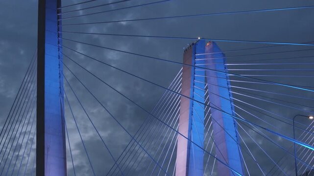 The Tappan Zee Bridge crossing The Hudson River at night. Shot on an overcast day during the summer.