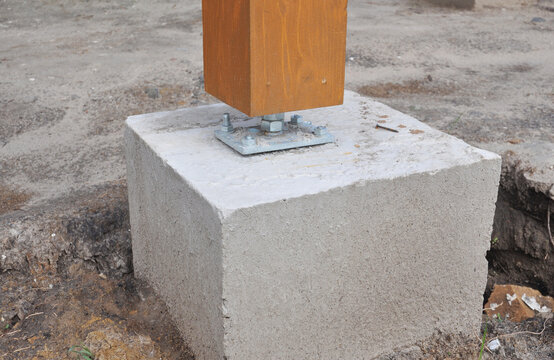 Pergola post installation on concrete footings
