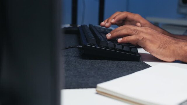Close-up of Male Software developer, Businessman hand typing on keyboard. Programmer typing write code for Software development and Cyber security concept.