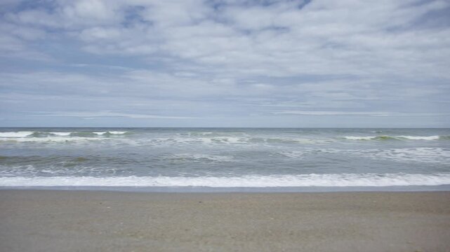 right to left pan of the beach at Anderby Creek in the UK