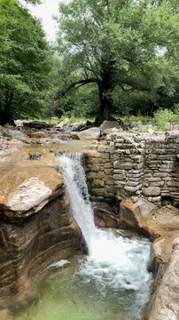 Picturesque river with cascades in Okatse canyon in Georgia