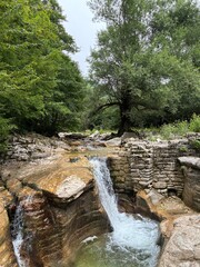 Picturesque river with cascades in Okatse canyon in Georgia © Natalia