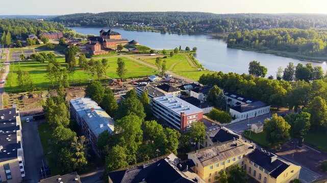 H&auml;meenlinna city main castle park and Vanaja shore from air in Finland early morning. 