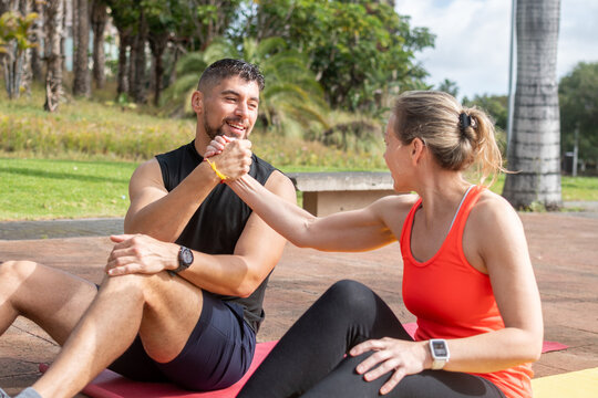Fitness partners celebrating after successful outdoor workout