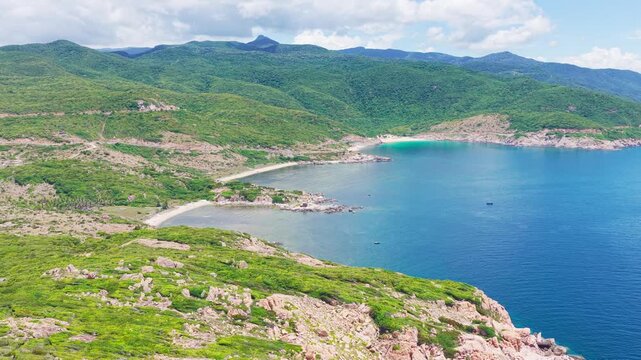 Aerial view of Vinh Hy Bay rocky coastline and crystal clear water in Ninh Thuan Vietnam