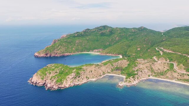 Aerial view of hidden tropical bay and rocky coastline at Vinh Hy Ninh Thuan Vietnam