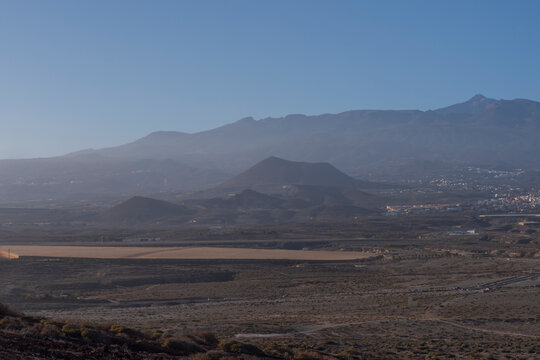 Beautiful panoramic landscape viewed from Red Mountain featuring Mount Teide, volcanic hills and the natural scenery of Tenerife, Spain.