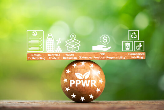 PPWR text on wood, icons about packaging and packaging waste regulation concept.