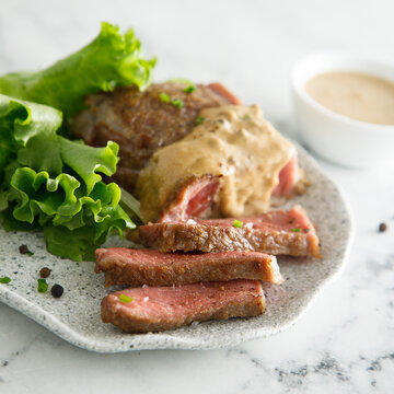 Beef steak with peppercorn sauce