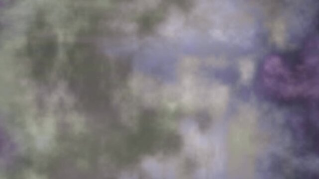 Abstract loop background with soft purple and white cloud textures