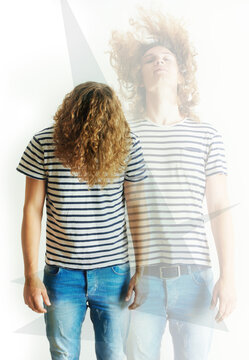 Fashion, double exposure or man with long hair with jeans, hipster clothes, punk style in studio. Creative overlay, edgy aesthetic or young male person with cool or stylish shirt on white background