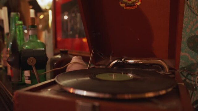 Vintage gramophone playing a spinning vinyl record