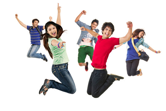 A group of young boys and girls in casual clothing jumping with various body gestures 