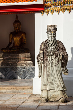 A wat Pho Chinese stone guardian, Bangkok, Thailand