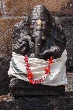 Scene featuring ganesh Hindu god statue in Gangai Konda Cholapuram Temple. Tamil Nadu, India