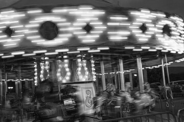 Carousel ride at night with intentional motion blur black and white © Sandy Ashley