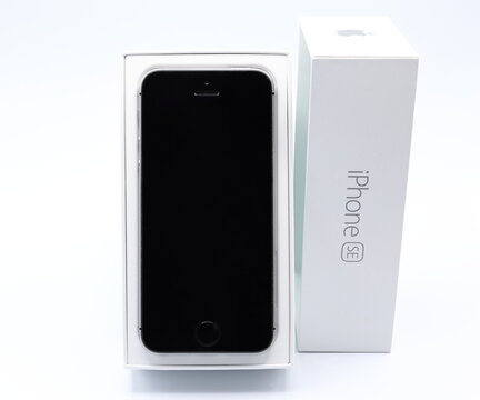 Iphone box. Cell phone. From the company Apple. White background. Close up product photo.