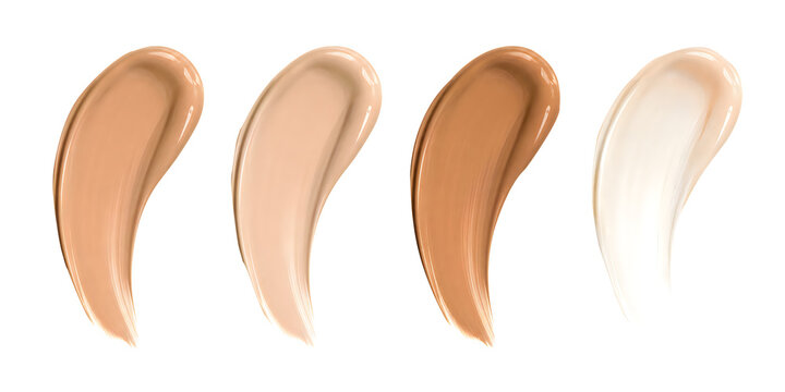 Four cosmetic foundation swatches in different nude shades, isolated on transparent background, makeup color testing and beauty product samples.