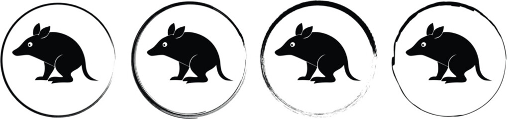 Fototapeta premium A set of four circular featuring a black silhouette of an armadillo animal, presented on a white background, for your creative projects