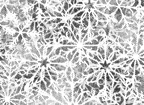 Extreme macro of printed halftone dots forming large snowflakes and snowy texture.
