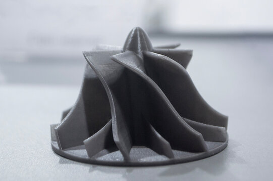 Art model printed on 3D printer. Object created on 3D printer from molten plastic. 3D printed creative object. Modern new modern additive progressive technologies. 3D printing technology