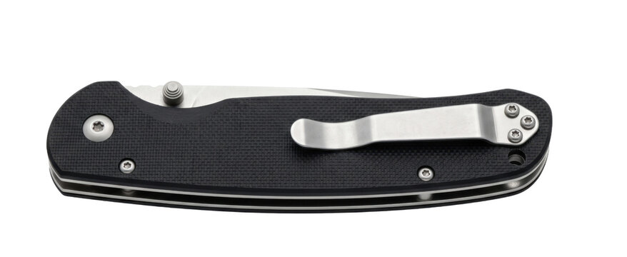 Close-up view of a black folding pocket knife with a metal clip and textured handle