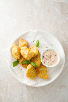 Homemade chicken nuggets with sauce