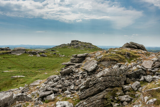 Lovely Summer day landscape image of Rough Tor on Bodmin Moor in English countryside