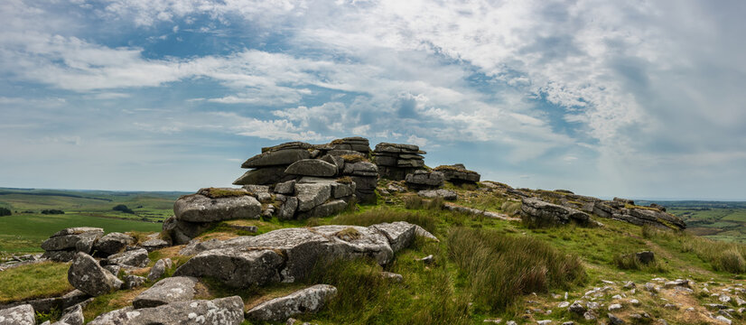 Lovely Summer day landscape image of Rough Tor on Bodmin Moor in English countryside