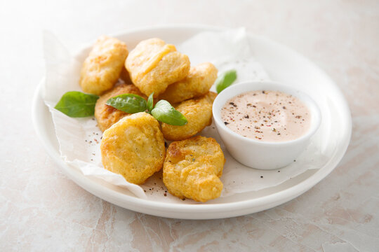 Homemade chicken nuggets with sauce