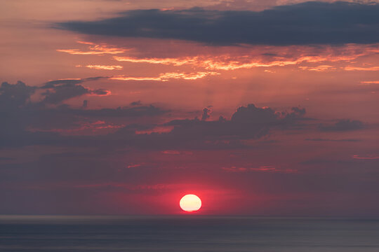 Stunning peaceful Summer sunset landscape over Trevose Head in Cornwall England
