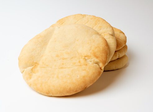 Pita flat bread, wheaten pitta flatbread also known as Arabic bread, chapati, greek pita naan, khubz