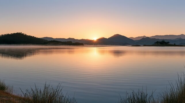 Serene lakescape at sunrise: broad panorama across Lake Casitas and surrounding hills
