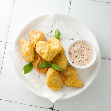 Homemade chicken nuggets with sauce