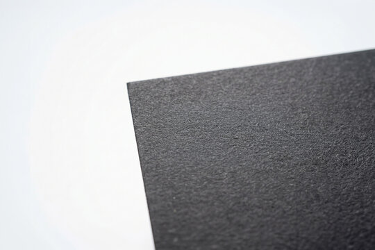 Black textured paper corner