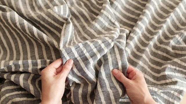 Navy blue and white striped linen fabric. Ideal for summer fashion promos, textile industry presentations, coastal interior decor themes, sewing and tailoring business, textile stores.