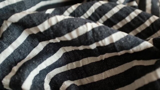 Dark navy blue and white striped linen fabric. Ideal for summer fashion promos, textile industry presentations, coastal interior decor themes, sewing and tailoring business, textile stores.