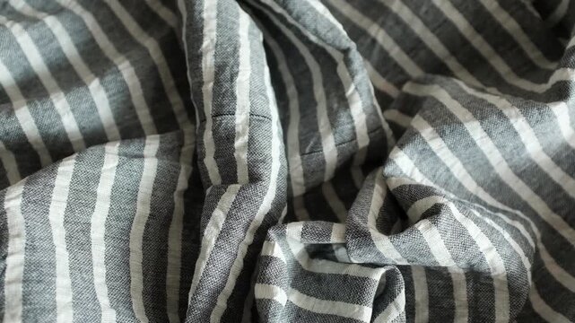 Dark navy blue and white striped linen fabric. Ideal for summer fashion promos, textile industry presentations, coastal interior decor themes, sewing and tailoring business, textile stores.