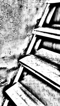 High-contrast black and white grunge abstract background of industrial metal staircase stairs with checkered diamond plate texture near old wall.