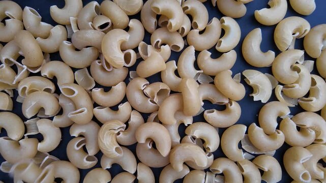 Slow Motion Italian Pasta Ingredient Shot , Pasta Falling